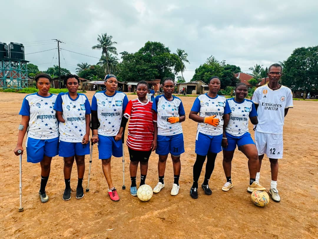 Disabled male and female football players